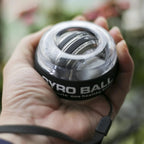 Gyro Strength Ball – Auto‑Start Power, 61 kg Resistance, For Grip & Forearm Training